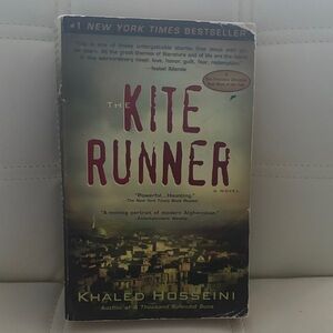 The Kite Runner by Khaled Hosseini - Paperback, Green/Tan Cover